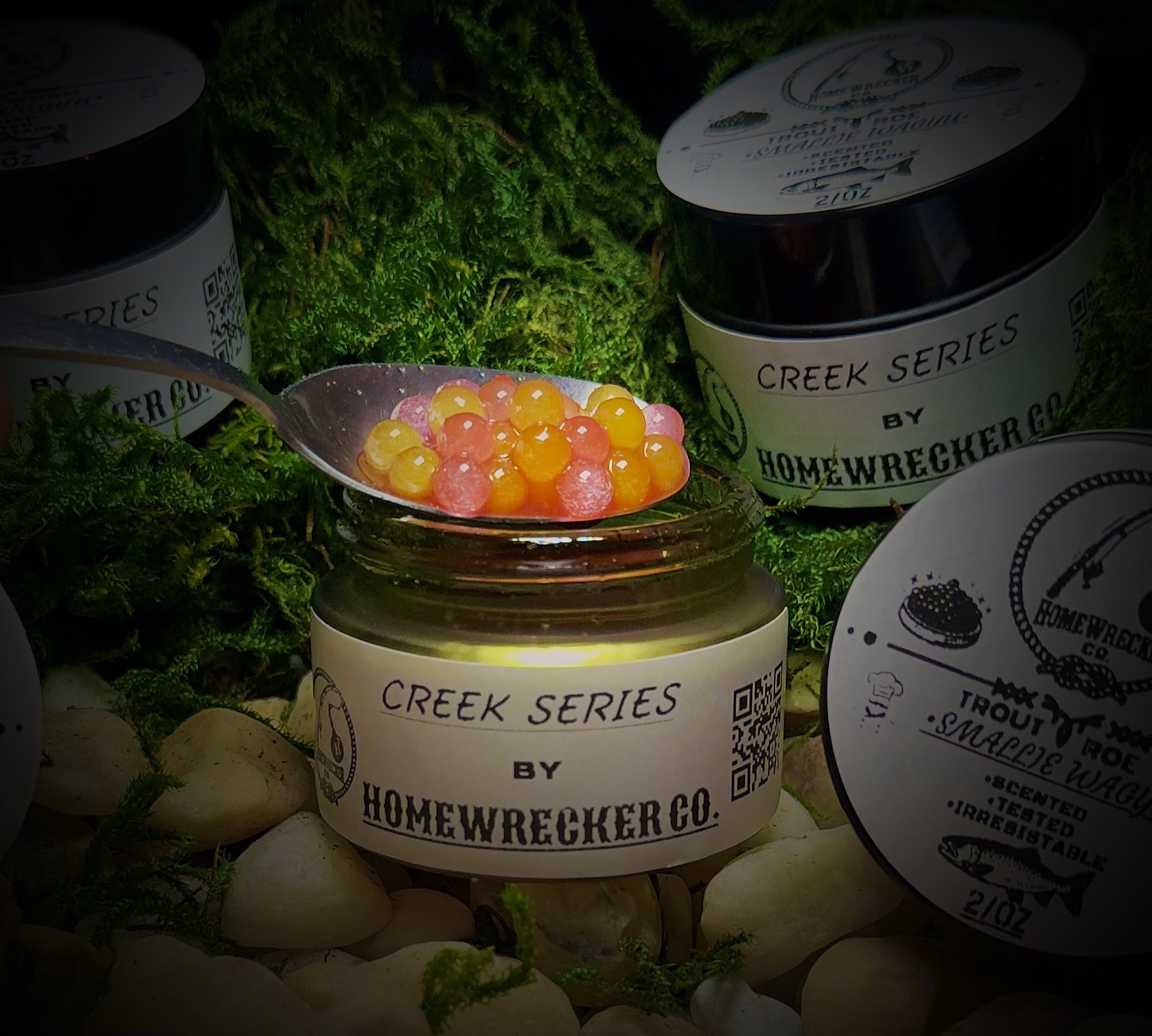 Jar of Homewrecker Trout Caviar with orange and pink trout bait on a spoon